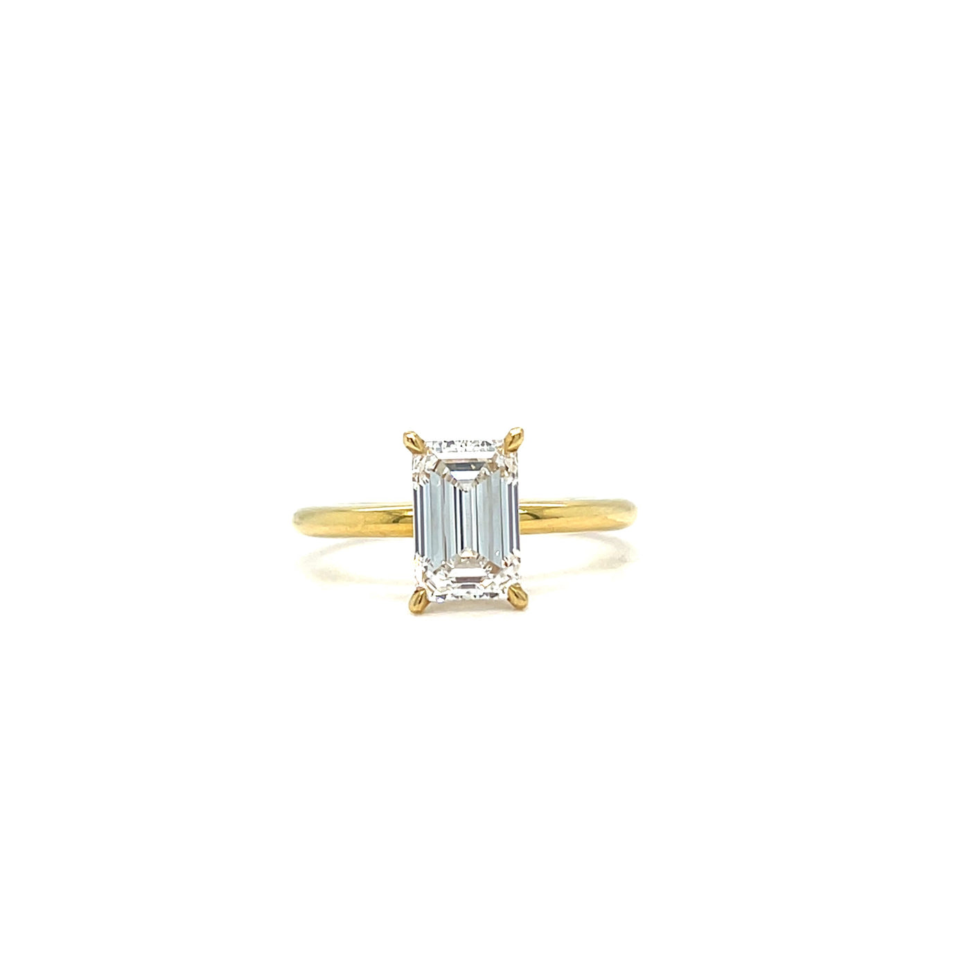 18CT yellow gold emerald cut diamond solitaire engagement ring 