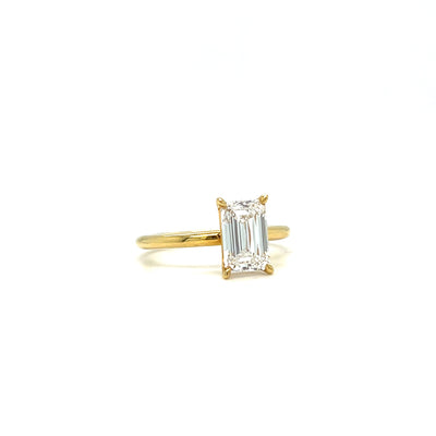 18CT yellow gold emerald cut diamond solitaire